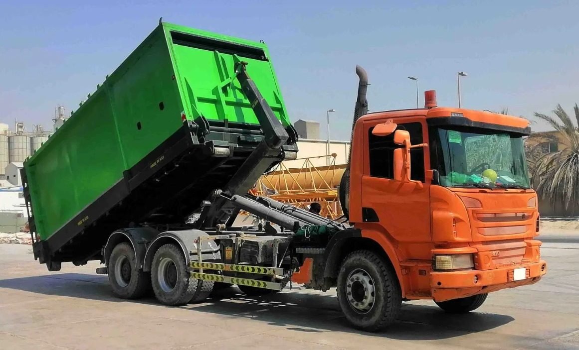HYE-LIFT hook loader handling a container